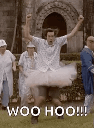 Man in a tutu dancing and cheering Woo hoo